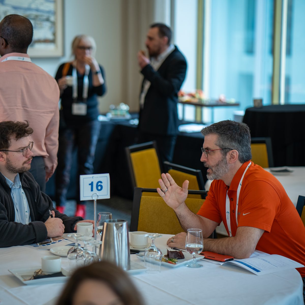 Small-group discussion during an Innovation Leaders Club meeting